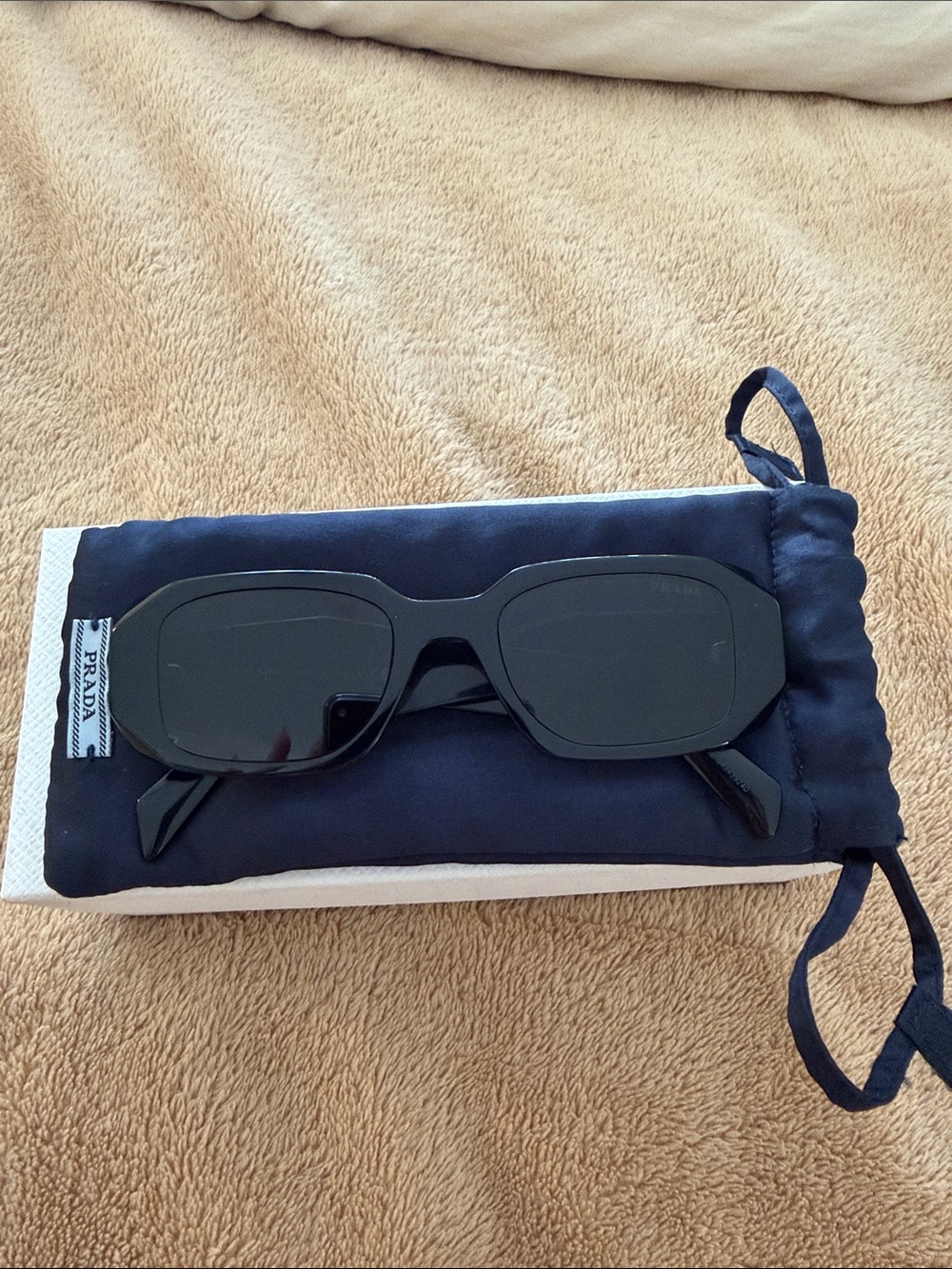 Prada Black Slim Rectangular Sunglasses
Comes with box, case and dust bag